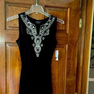 Black v neck midi dress with beaded trim. Never worn.